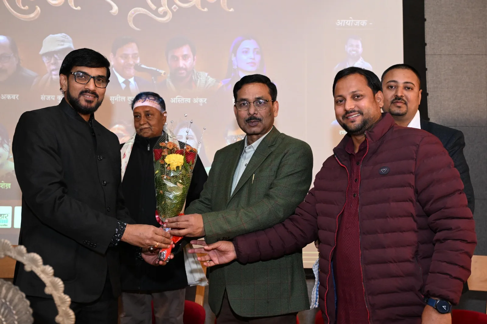 On stage at a pustak vimochan.