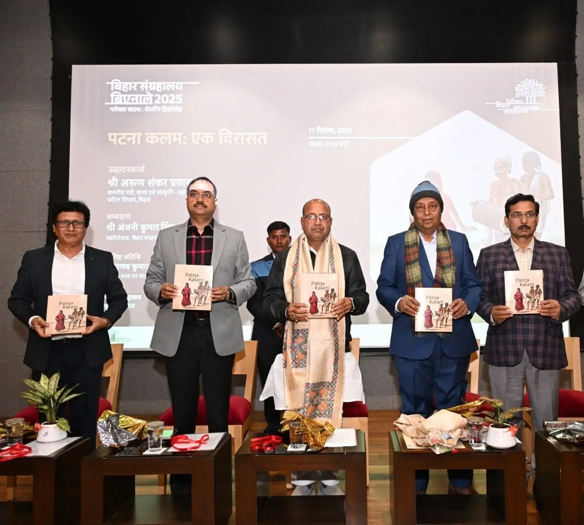With the panel at a book launch.