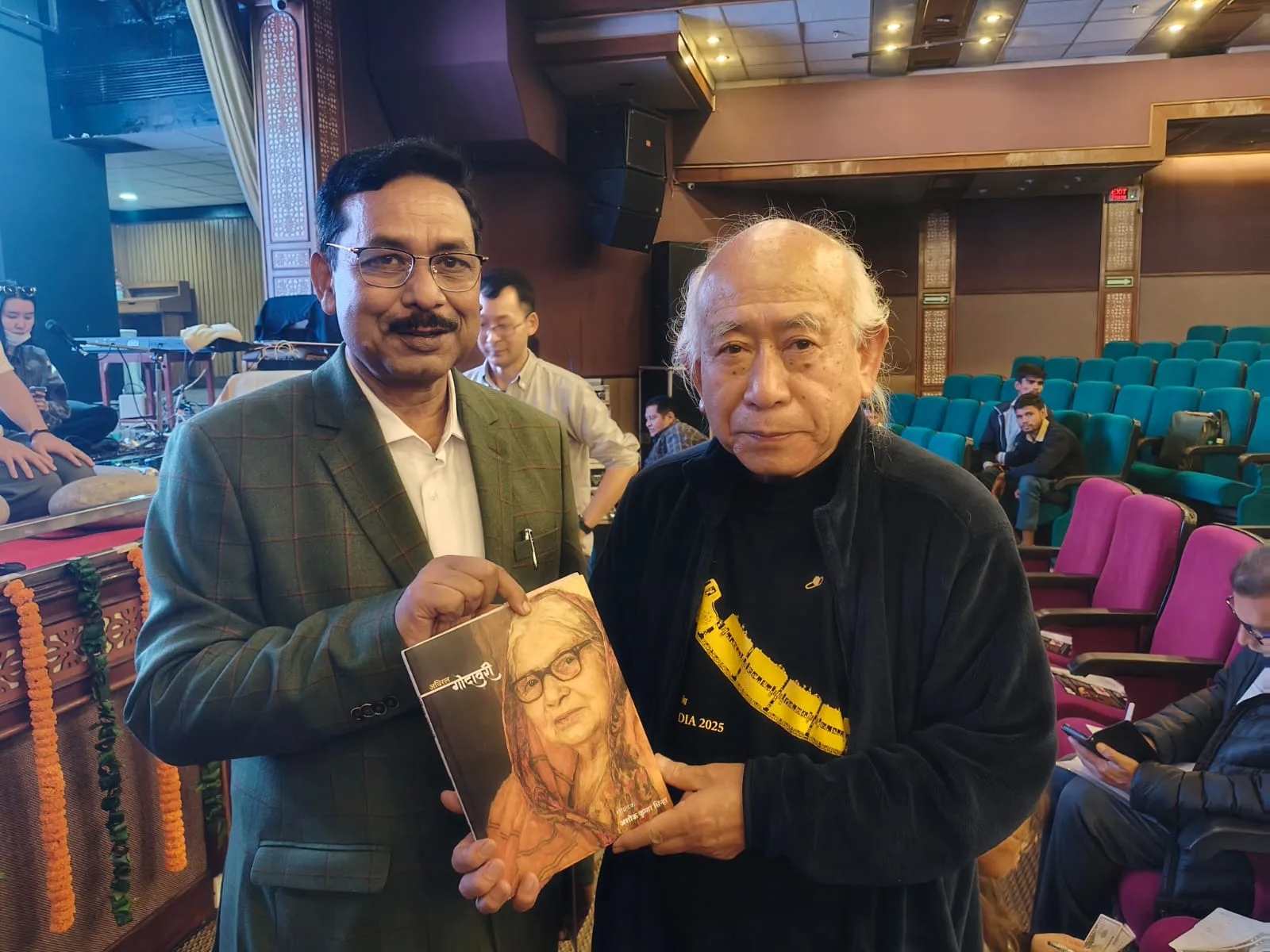 On the dais at a pustak vimochan.