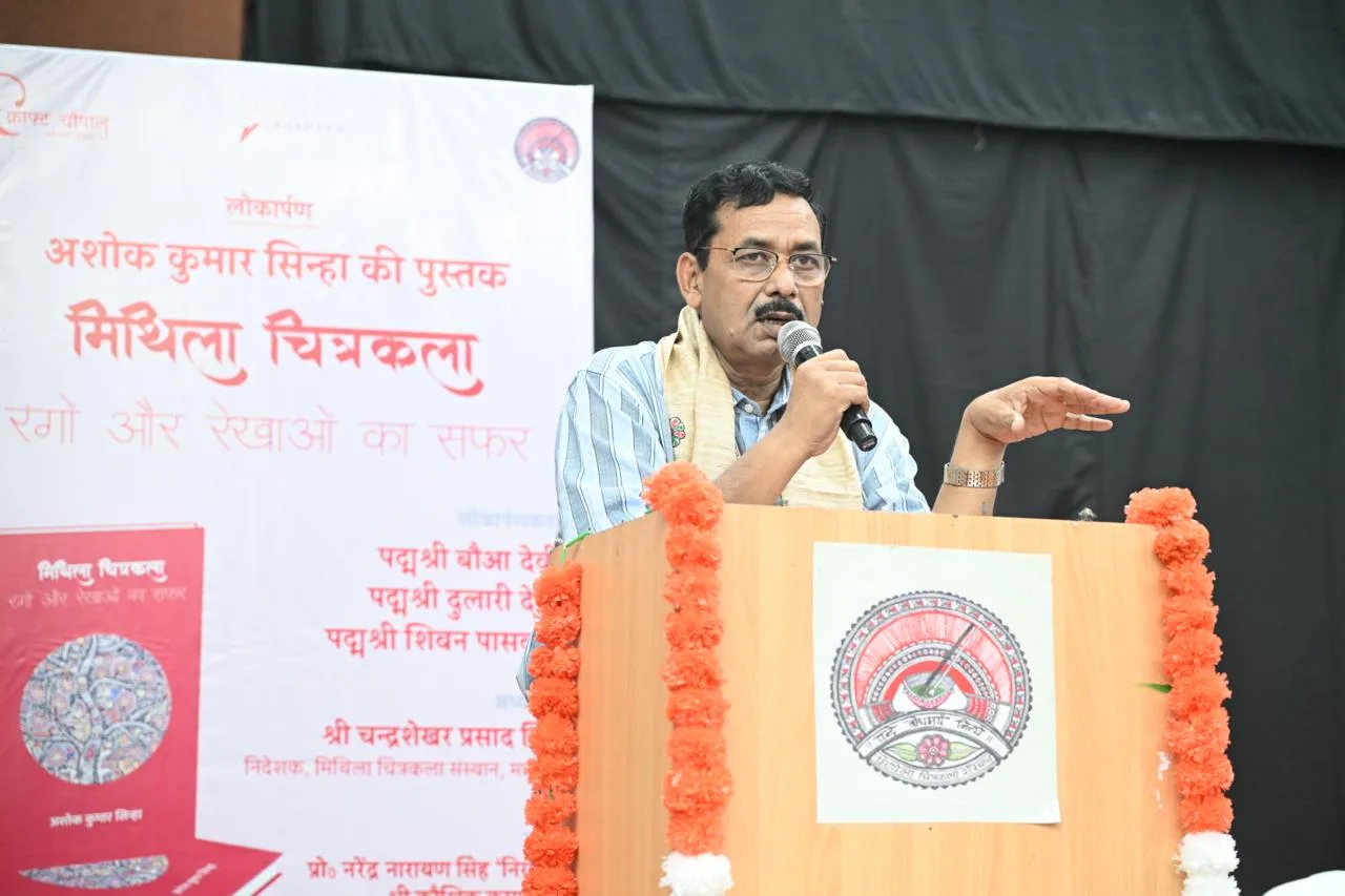 Addressing a gathering.